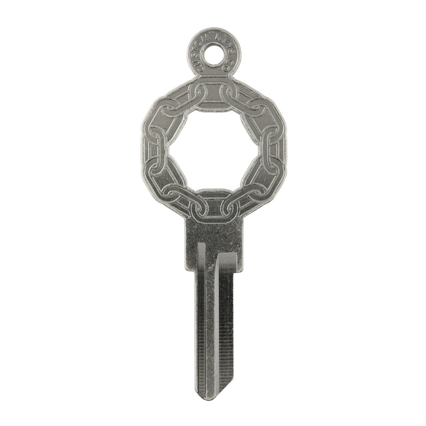 Silver key on white background with chain design.