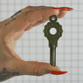 The Gridlock House Keys in Hand