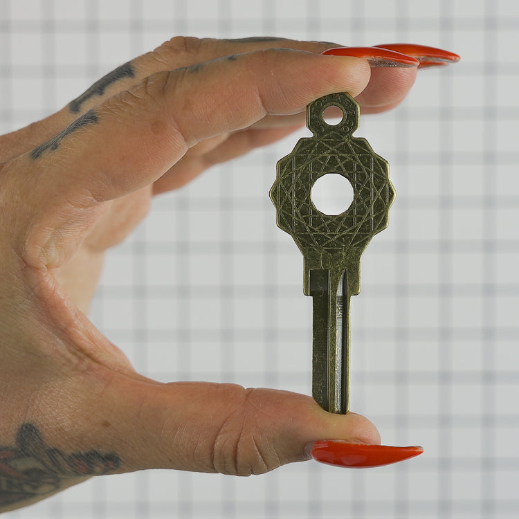 The Gridlock House Keys in Hand