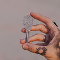 Holding KW1 Skeleton House Key Blank