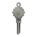 Silver key on white background with mandala design.
