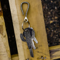 The Line Silver Keyring on Crate with Keys