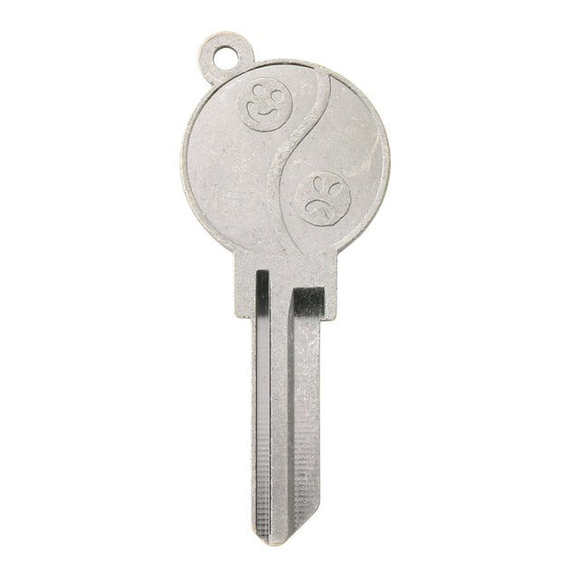 Metal key blade with Yin and Yang design on a white background